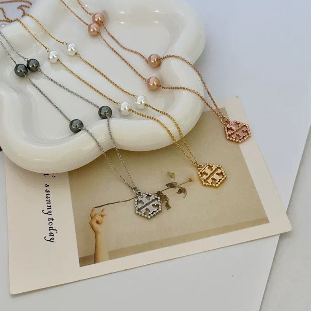 Tory Burch Hollow Hexagon Alphabet Pearl Long Metal Necklace